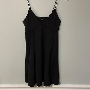 Little a-line black dress. Kendall and Kylie brand. Low cut. Size medium